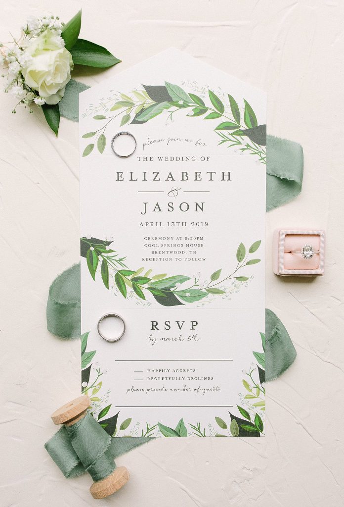 Styled Invitation with green ribbon