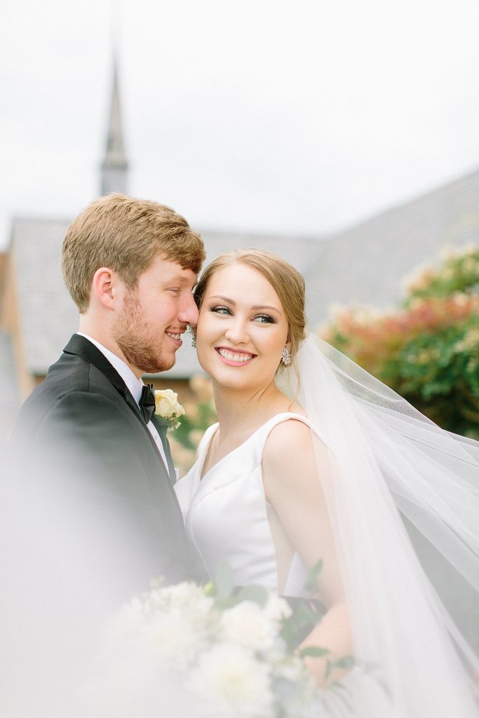 Incredible cathedral length veil shot on a traditional wedding day