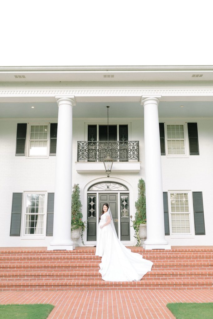 White Historic Home in Mississippi is the perfect backdrop for bridal portraits.