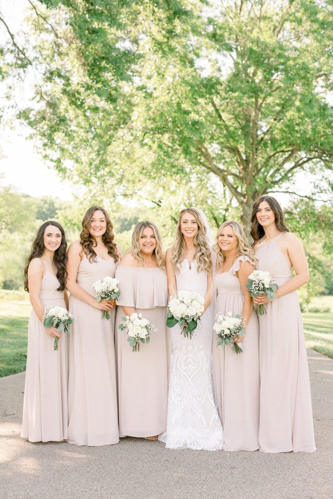 Nude and light pink bridesmaids dresses, perfect for spring!